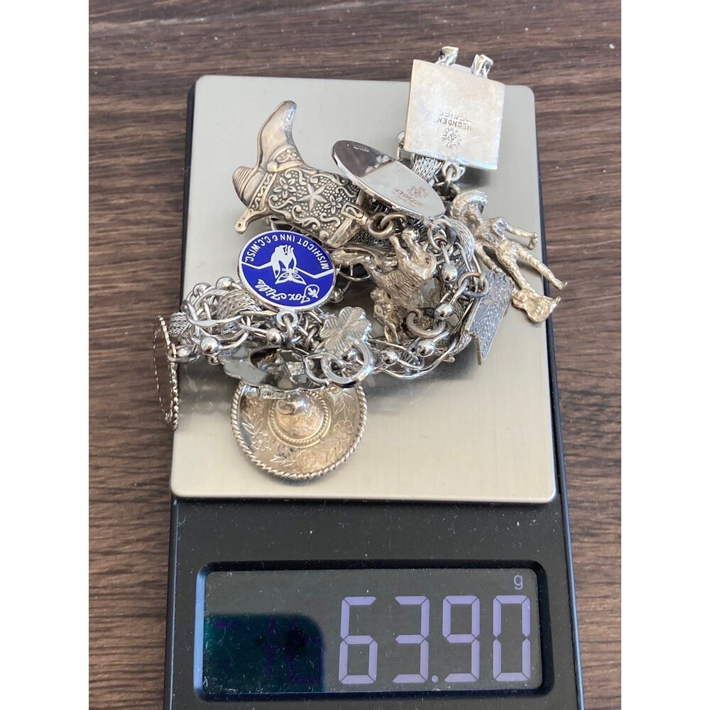 63.9g Super heavy Vintage sterling silver cowboy Charm Bracelet